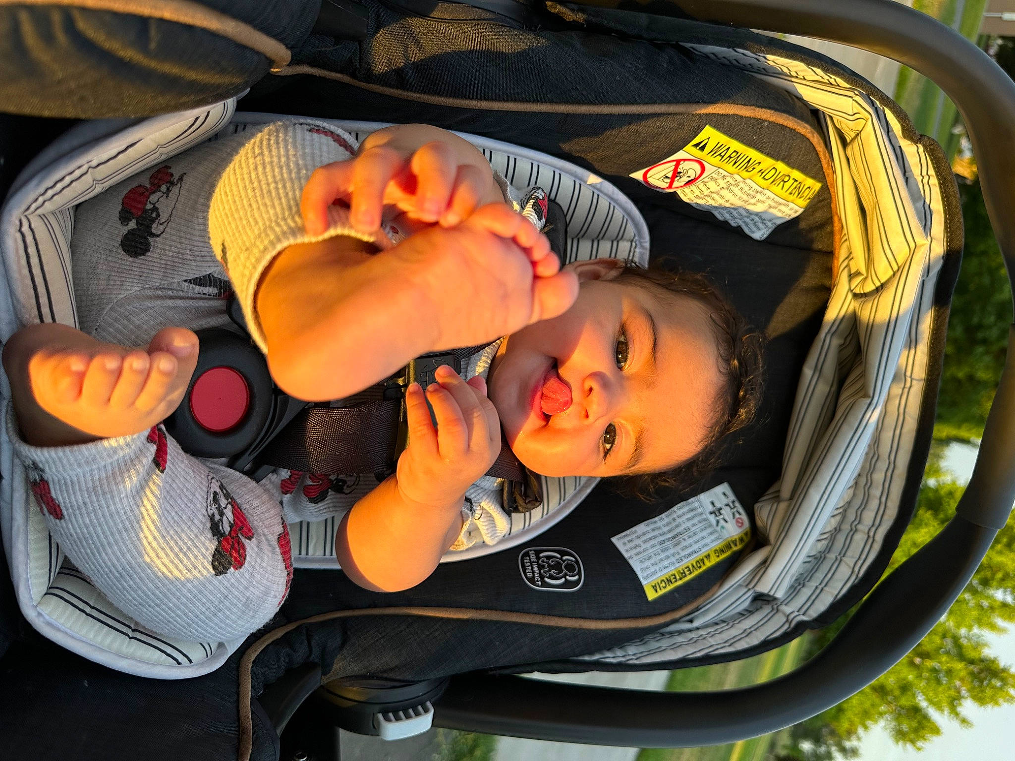 Armani joined the competition — help win amazing prizes! auto_part, automotive_exterior, automotive_lighting, baby, baby_carriage, baby_products, bag, child, comfort, fun, grass, headgear, leisure, luggage_and_bags, motor_vehicle, orange, person, personal_protective_equipment, recreation, toddler