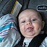 baby, infant, car_seat, pacifier, child, cloth, striped, face, blue_eyes, safety_harness, evenflo, close_up, cute, young_child, indoor, seat, portrait, expression, head, skin