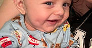 Austin joined the competition — help win amazing prizes! baby, child, adult, smile, pajamas, food_prints, dimples, face, hand, arm, piercing, necklace, indoor, person, holding, happy, cute, closeup, affection, bond