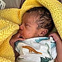 Za'Kai is registered to the contest to win money with this photo: newborn, baby, sleeping, blanket, yellow, dinosaur_print, onesie, infant, pacifier, hand, face, curly_hair, cozy, closeup, soft_texture, cute, peaceful, indoors, portrait, resting