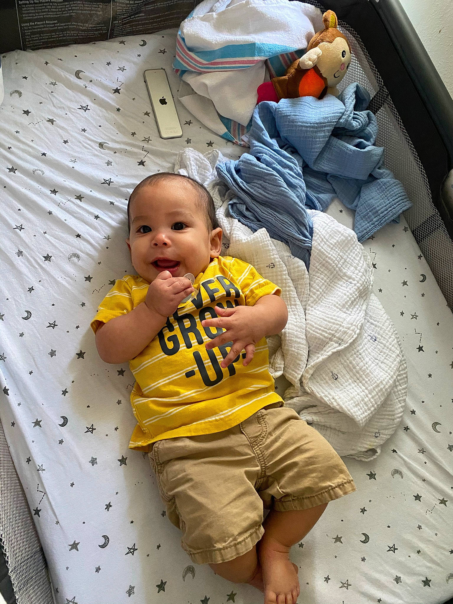 Reid joined the competition — help win amazing prizes! baby, baby_products, baby_toddler_clothing, child, comfort, flooring, fun, happy, human, leisure, linens, pattern, person, play, room, shorts, sitting, smile, t_shirt, toddler