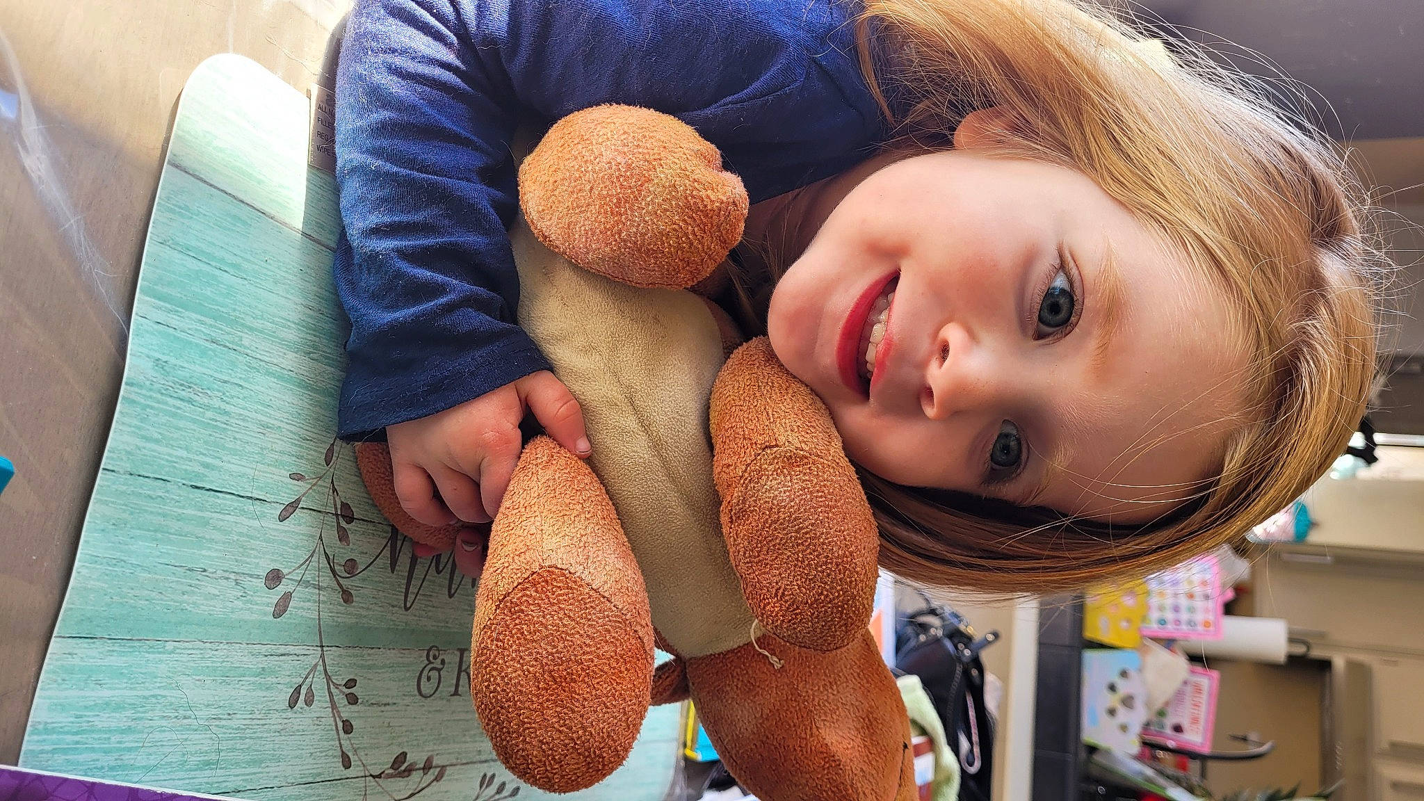 Adelyn is registered to the contest to win money with this photo: bangs, blond, eyelash, foot, fun, gesture, happy, human_body, human_leg, joy, leisure, lip, long_hair, mouth, nail, neck, person, skin, smile, textile