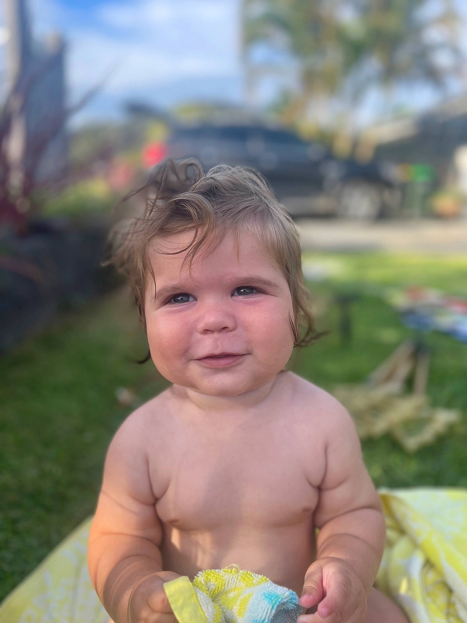 Madix is registered to the contest to win money with this photo: abdomen, baby, baby_toddler_clothing, chest, child, fun, grass, happy, joy, leisure, people_in_nature, person, plant, recreation, sitting, skin, sky, smile, toddler, tree