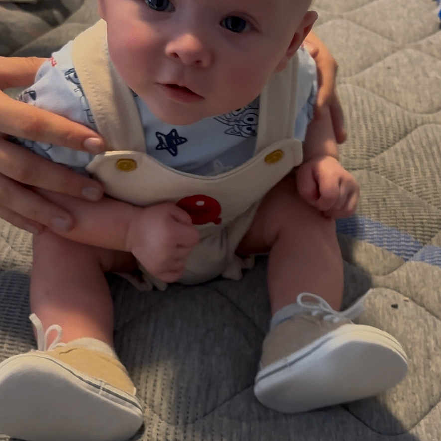 Luca joined the competition — help win amazing prizes! ankle, baby, bodypart, clothing, couch, crawling, face, finger, footwear, furniture, hand, head, newborn, pants, person, photography, portrait, shoe, sitting, sneaker