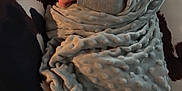 Rhyatt is registered to the contest to win money with this photo: baby, sleeping, blanket, pillow, pattern, texture, infant, peaceful, resting, cozy, soft, wrapped, child, young, cute, portrait, indoor, comfort, relaxation, closeup