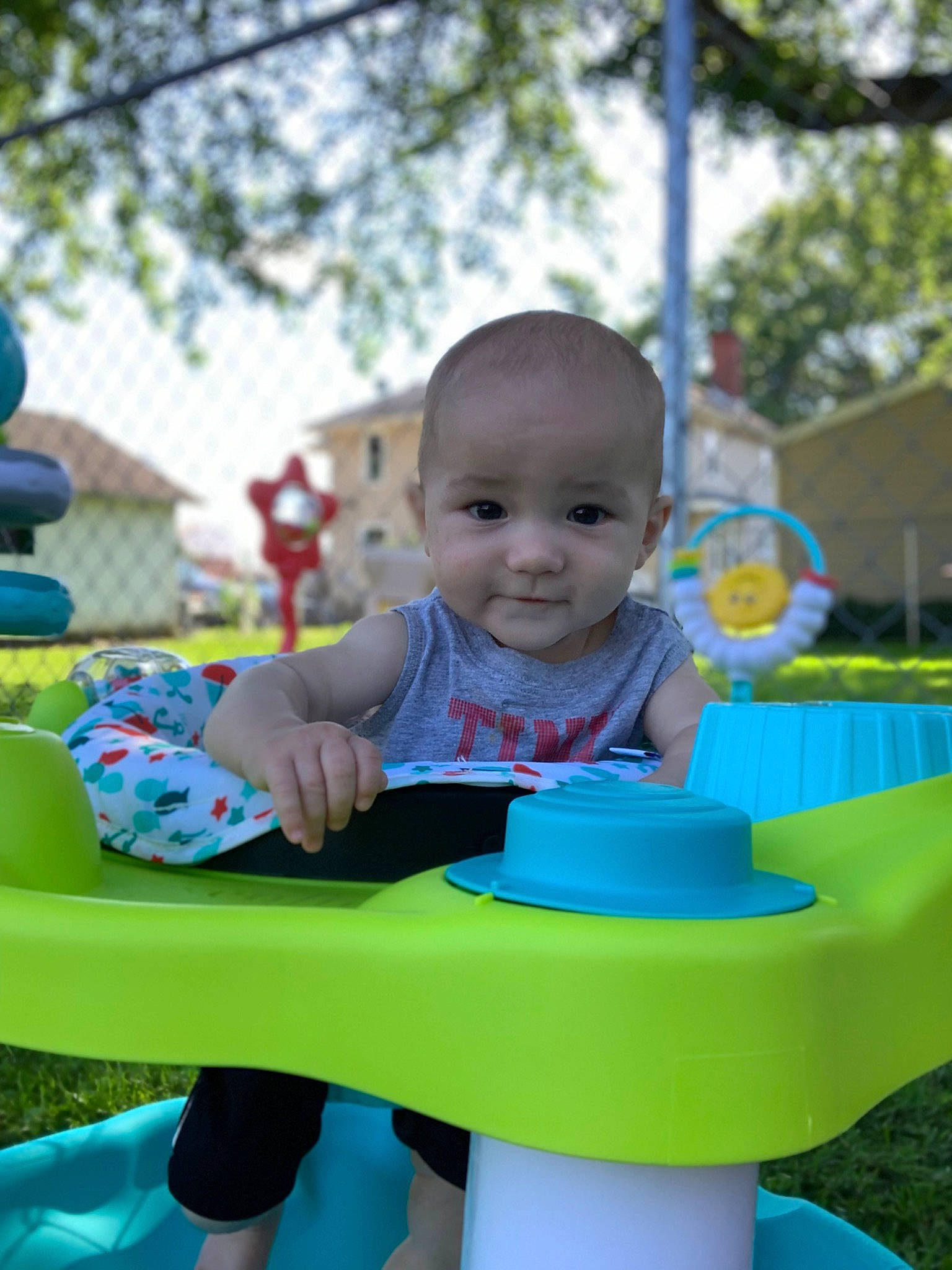 Stephen joined the competition — help win amazing prizes! baby, baby_playing_with_toys, baby_toddler_clothing, blue, child, city, clothing, face, facial_expression, fun, grass, happy, leisure, person, recreation, shorts, sky, smile, t_shirt, table