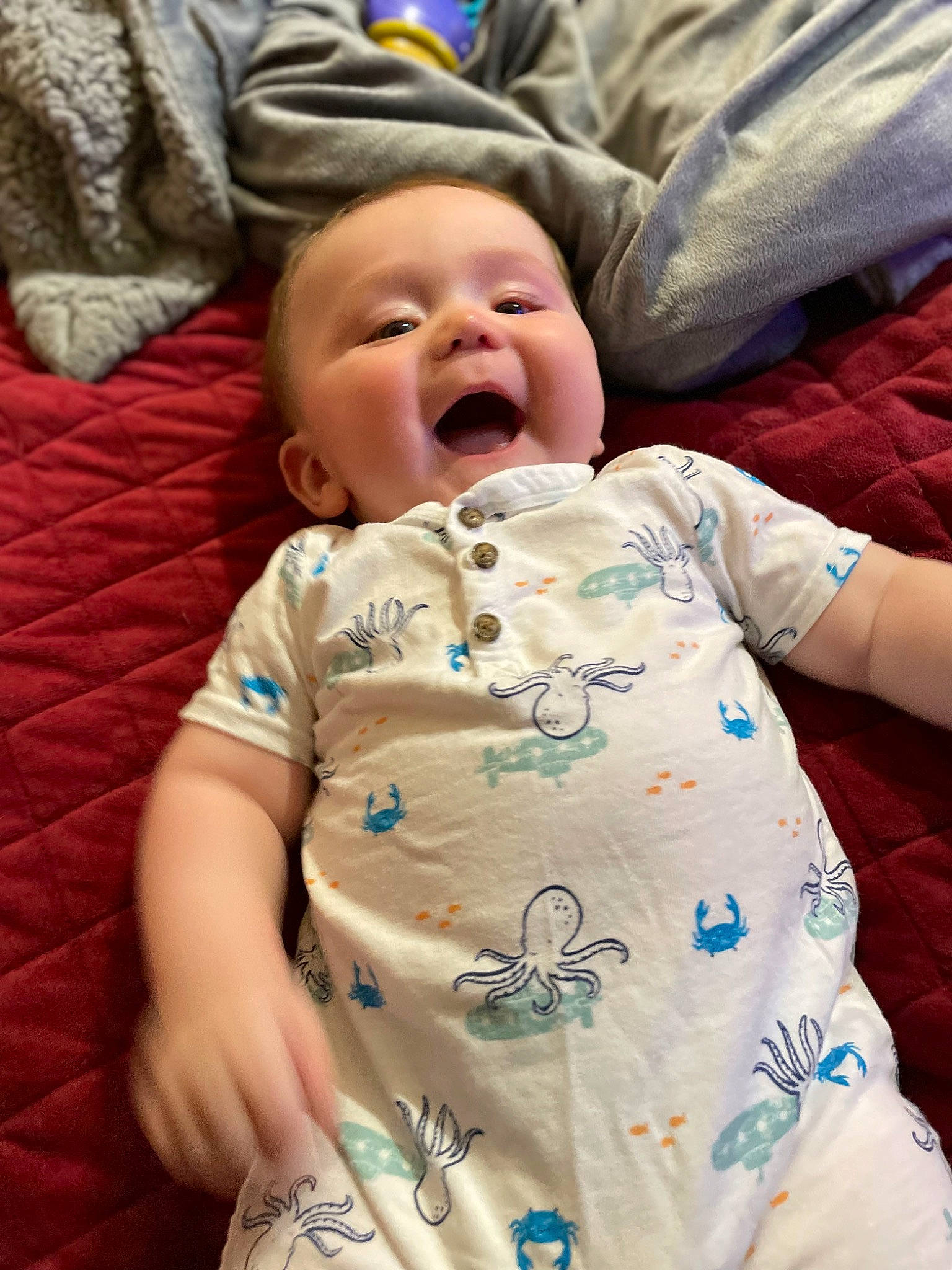 Jaiden joined the competition — help win amazing prizes! baby, baby_toddler_clothing, cheek, child, comfort, eye, facial_expression, fun, gesture, happy, head, human_body, linens, mouth, nose, person, skin, sleeve, smile, textile
