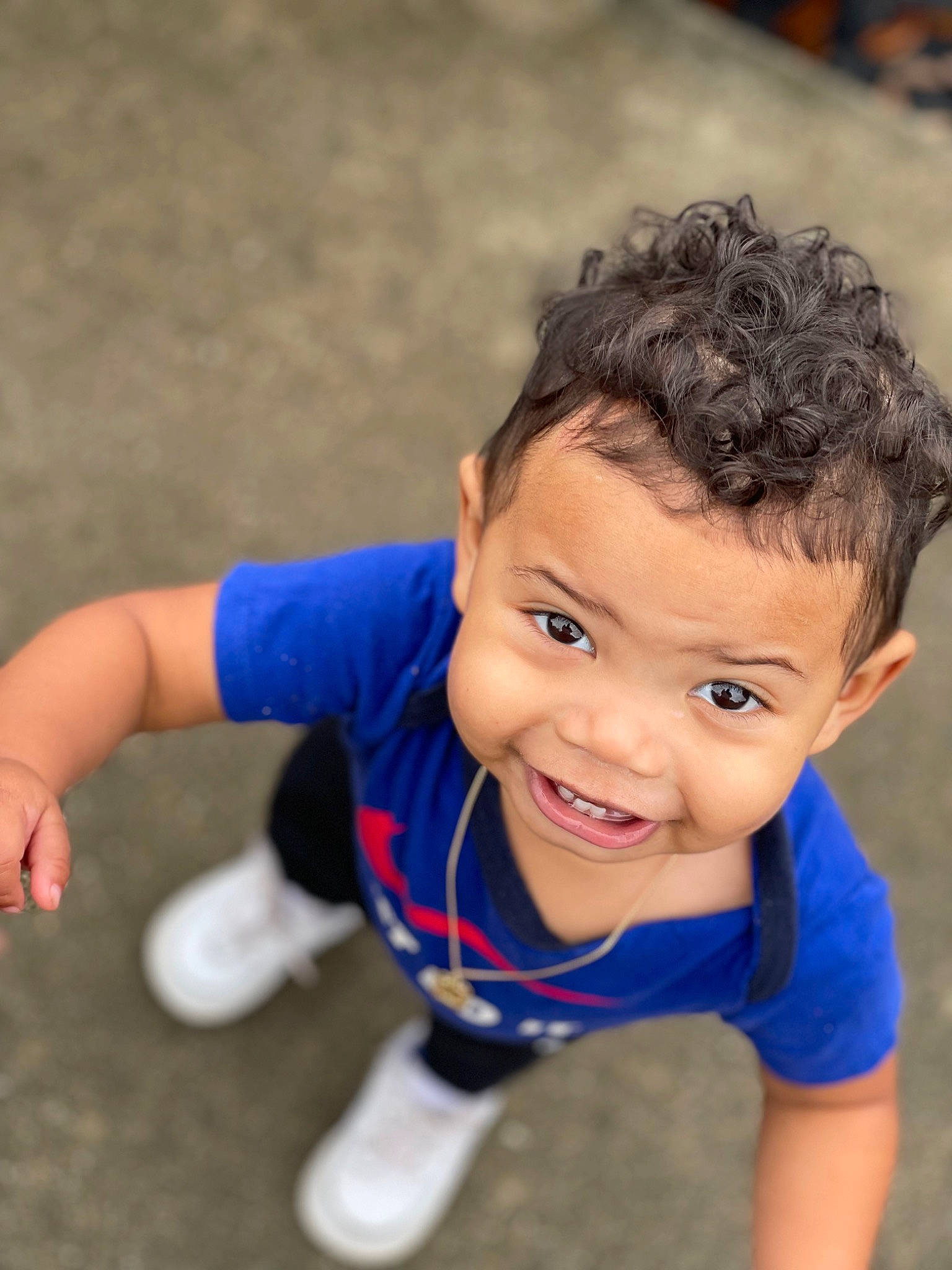 Kyson is registered to the contest to win money with this photo: arm, child, chin, electric_blue, eye, face, finger, flash_photography, flooring, fun, hand, happy, joy, leisure, nose, person, player, skin, smile, t_shirt