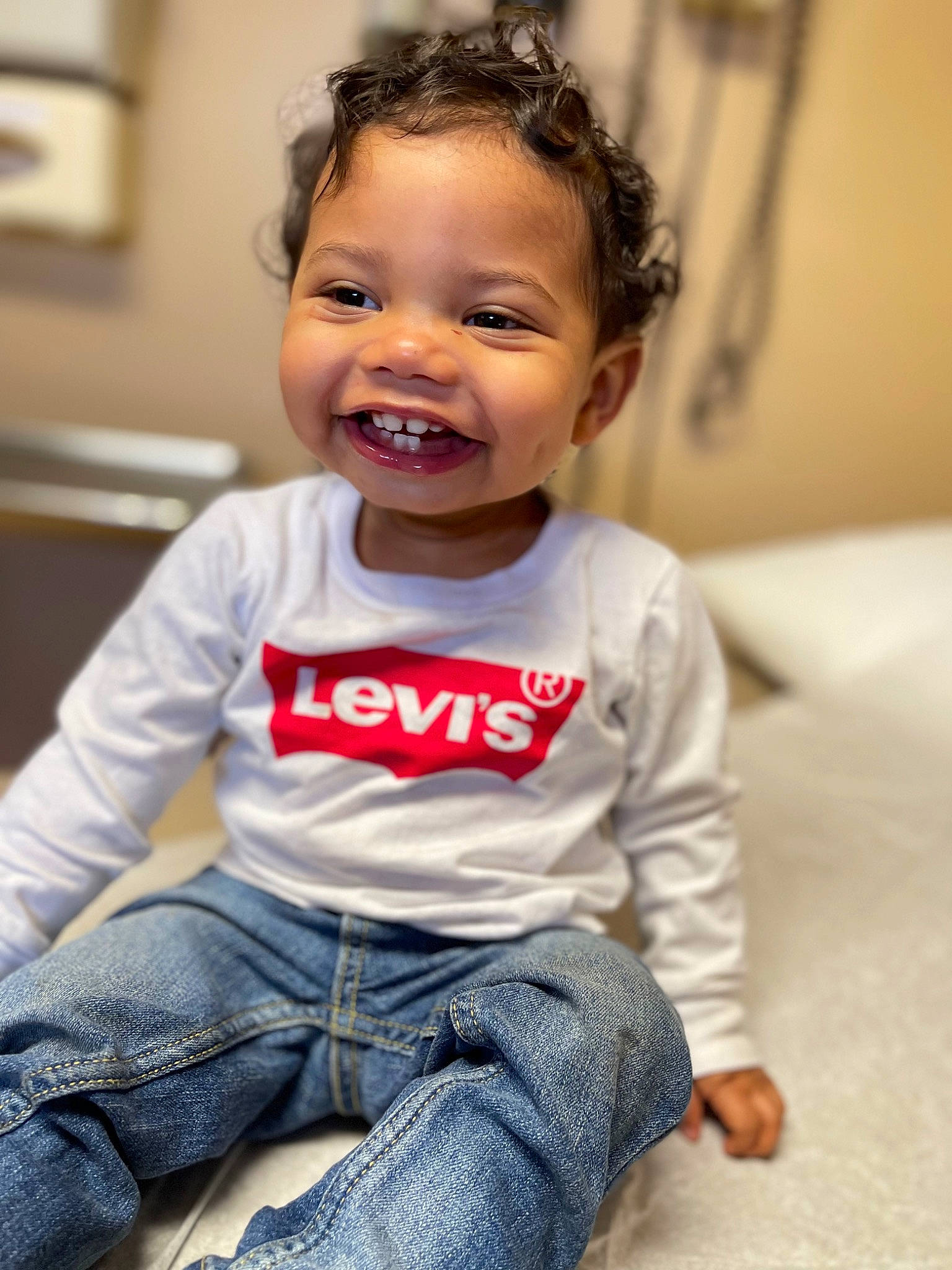 Kyson is registered to the contest to win money with this photo: baby_toddler_clothing, cheek, chin, clothing, eye, eyebrow, face, hair, hairstyle, head, human_body, jeans, joy, lip, mouth, neck, nose, person, shoulder, skin