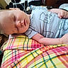 Ryan joined the competition — help win amazing prizes! baby, sleeping, onesie, bear_print, blanket, plaid, cozy, indoor, child, infant, peaceful, resting, soft, cute, hand, face, head, clothing, home, comfort