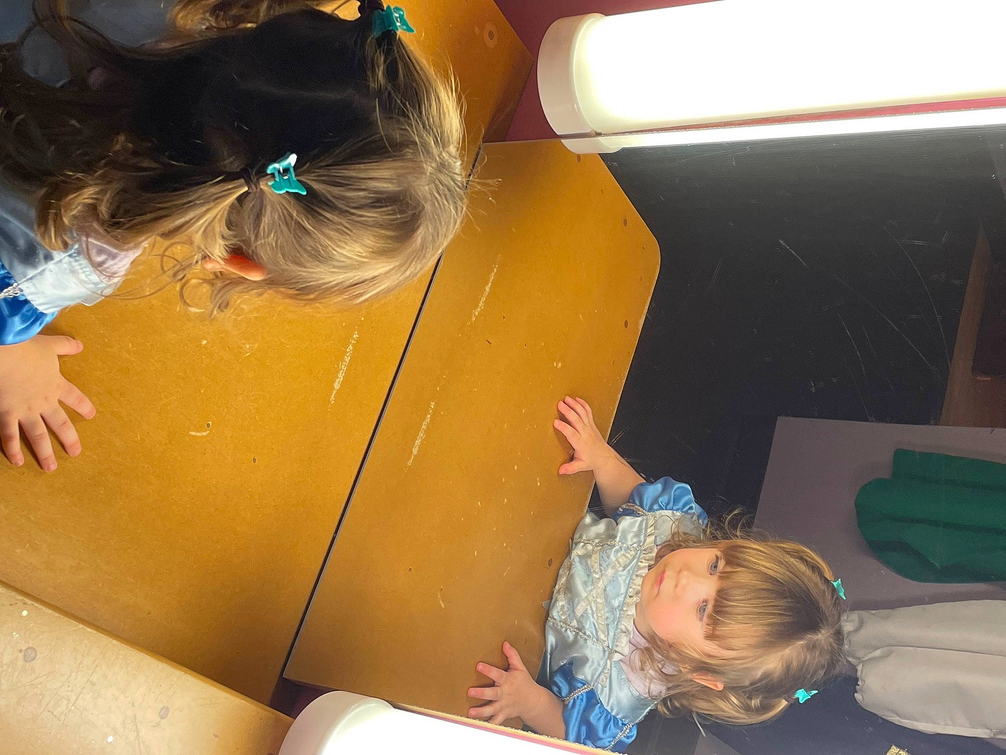 Lucy is registered to the contest to win money with this photo: child, comfort, elbow, fun, human_leg, knee, learning, leisure, mouth, nail, person, play, room, service, space, t_shirt, thigh, toddler