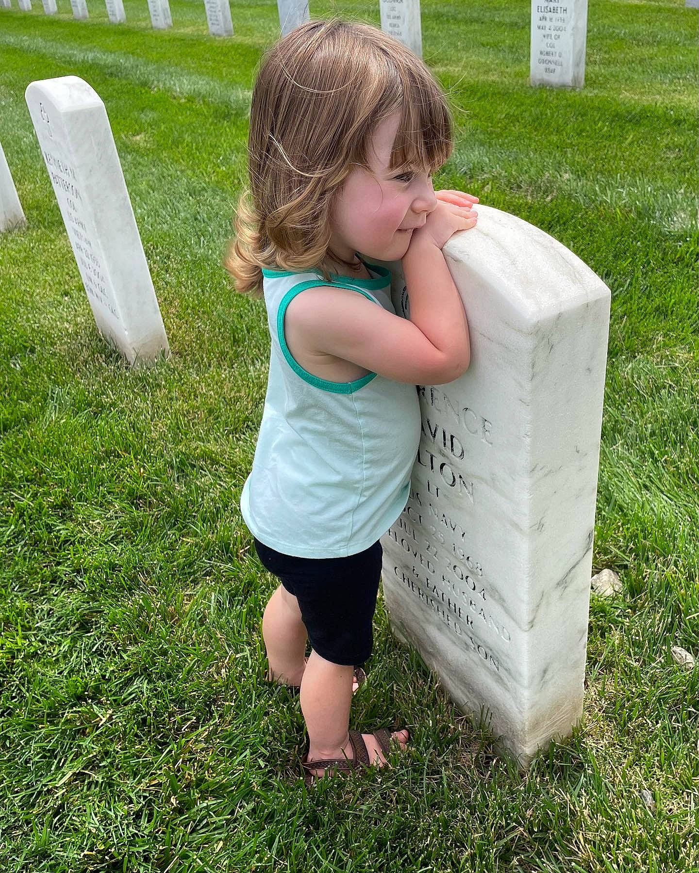 Lucy joined the competition — help win amazing prizes! baby_toddler_clothing, backyard, child, fun, garden, grass, grassland, green, happy, lawn, people_in_nature, person, play, shorts, sitting, spring, standing, summer, t_shirt, toddler