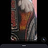 Dodge is registered to the contest to win money with this photo: cat, paw, polydactyl, feline, close_up, animal, pet, fur, toes, pattern, fabric, colorful, texture, blurry, zoomed_in, resting, soft, white, unique_trait, domestic_cat