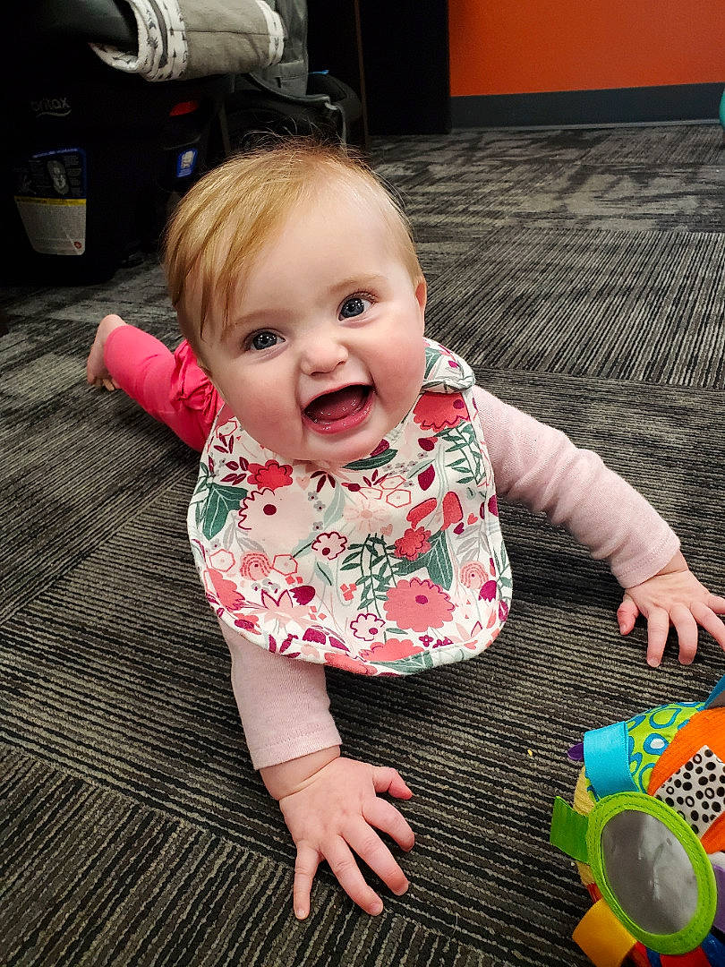 Willow joined the competition — help win amazing prizes! baby, baby_playing_with_toys, baby_toddler_clothing, cheek, dress, eye, face, floor, flooring, fun, happy, head, iris, person, photograph, product, skin, sleeve, smile, toddler