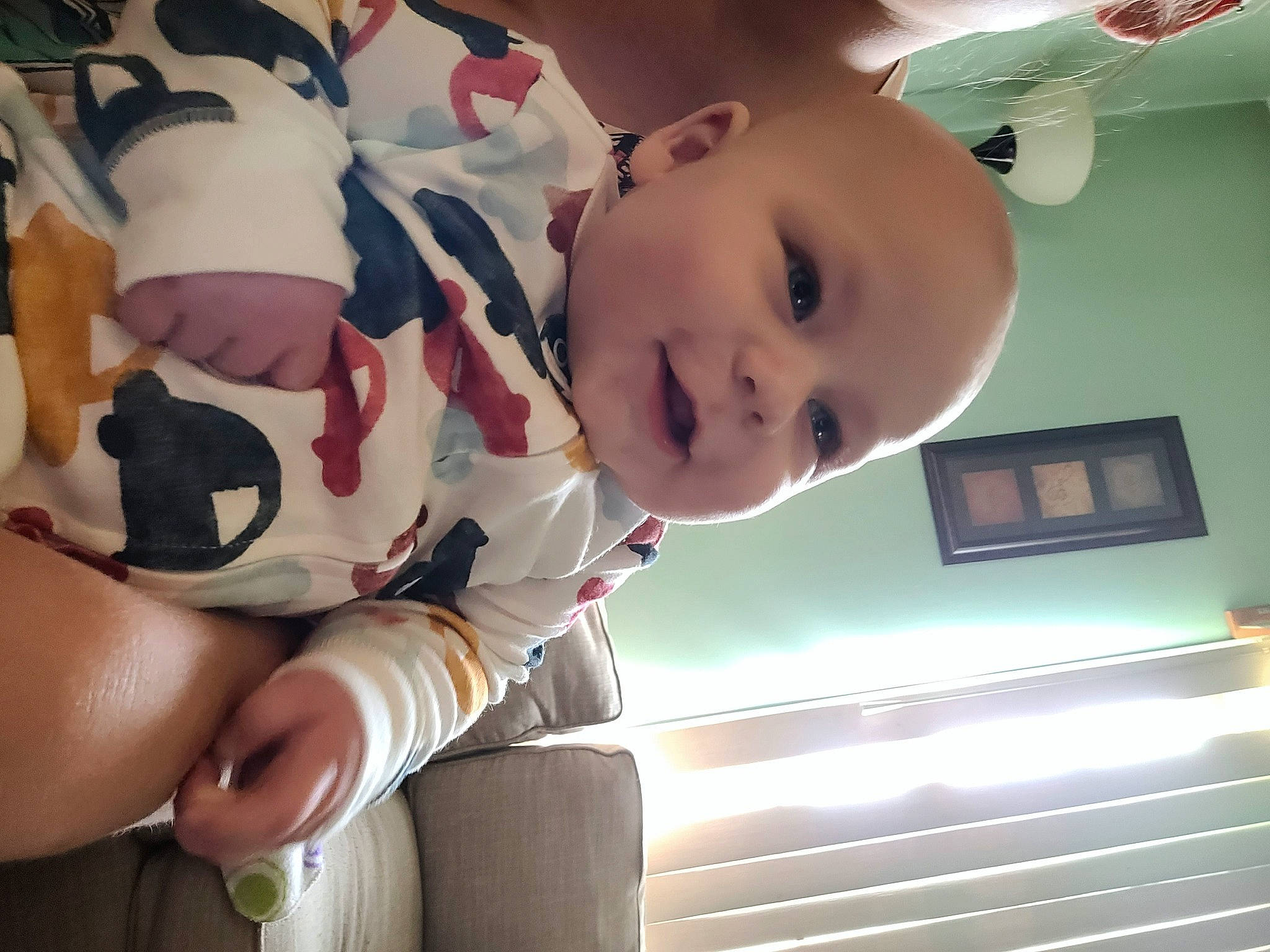 Clayton is registered to the contest to win money with this photo: baby, baby_toddler_clothing, black_hair, carmine, cheek, child, elbow, finger, fun, happy, human_leg, mouth, person, picture_frame, room, sleeve, smile, thigh, thumb, toddler