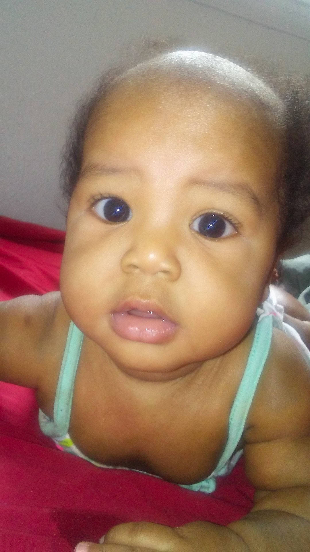 Amore is registered to the contest to win money with this photo: black_hair, cheek, child, child_model, chin, close_up, ear, eye, eyebrow, face, forehead, girl, head, infant, jaw, lip, mouth, nose, person, skin