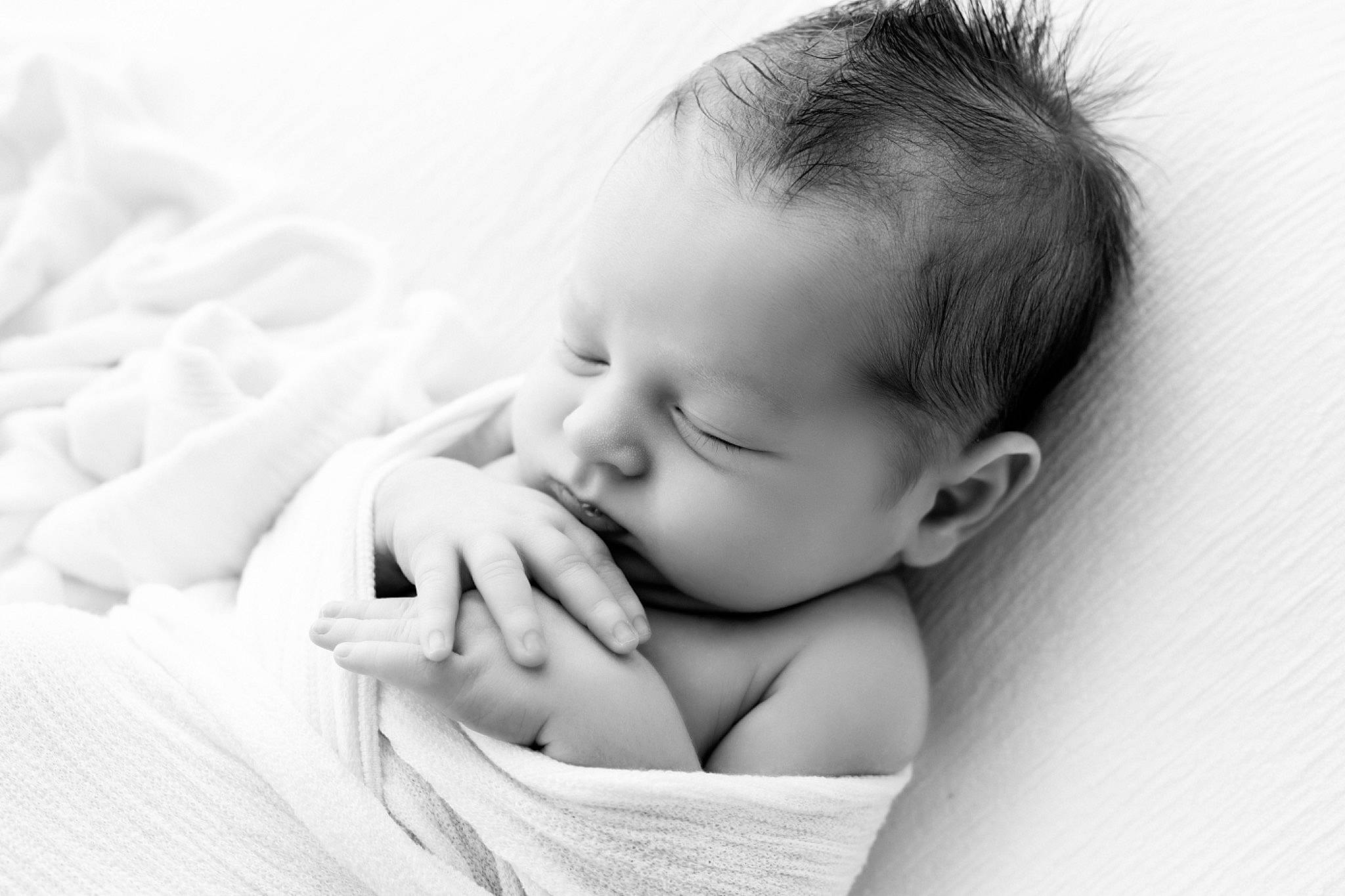Eli is registered to the contest to win money with this photo: baby, baby_sleeping, baby_toddler_clothing, bedtime, cheek, child, close_up, comfort, ear, eyelash, flash_photography, gesture, happy, linens, monochrome, monochrome_photography, nap, nose, person, stock_photography
