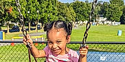 Brooklynn joined the competition — help win amazing prizes! child, swing, playground, smile, happy, outdoor, grass, trees, sunny, blue_sky, fence, footwear, pink_shirt, braided_hair, young_girl, park, summer, daylight, joyful, recreation