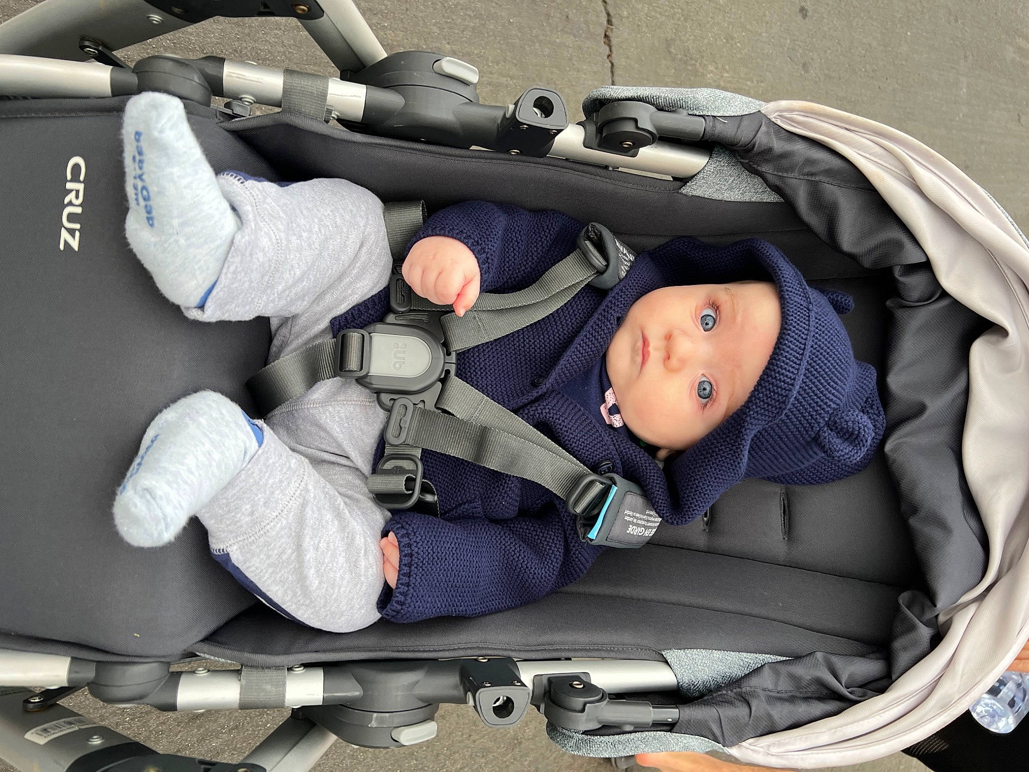 Mikael is registered to the contest to win money with this photo: arm, auto_part, automotive_design, baby, baby_carriage, baby_in_car_seat, baby_products, car_seat, child, comfort, gesture, headwear, health_care, lap, motor_vehicle, person, product, service, toddler, vehicle
