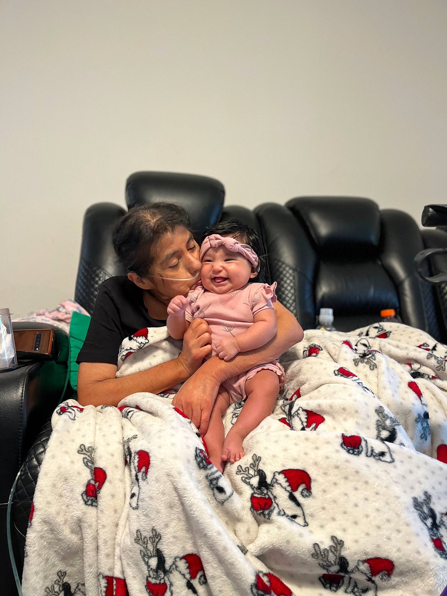 Leilah joined the competition — help win amazing prizes! baby, bed_sheet, bedding, bedroom, child, comfort, dress, event, flash_photography, formal_wear, fun, happy, headwear, leisure, linens, person, room, sitting, t_shirt, throw_pillow