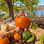 baby, pumpkin, autumn, fall, gourds, hay_bales, leaves, tree, outdoor, nature, child, cute, seasonal, orange, green, wood, fall_foliage, portrait, sitting, holiday