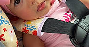 Arlanys joined the competition — help win amazing prizes! baby, child, car_seat, pink_bow, flower_pattern, seatbelt, infant, cute, portrait, indoors, car, sitting, clothing, headwear, face, hand, expression, child_seat, toddler, safety