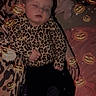 Nightlynn is registered to the contest to win money with this photo: baby, bed, black_pants, blanket, close_up, digital_filter, halloween, indoors, infant, jack_o_lantern, leopard_print, pajamas, peaceful, portrait, pumpkin, resting, sleeping, socks, sparkles, textile