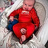 Nightlynn joined the competition — help win amazing prizes! baby, baby_clothing, bassinet, blanket, child, cozy, crib, face, happy, indoor, infant, lying_down, nursery, onesie, photography, portrait, red_outfit, sitting, smiling, stuffed_toy