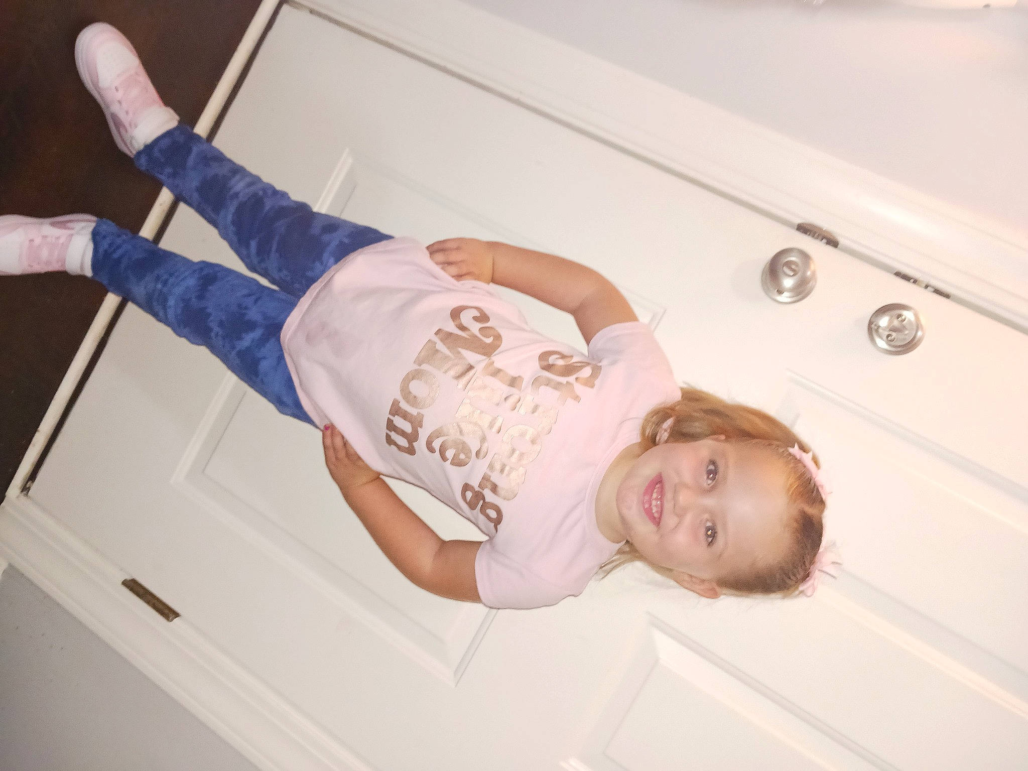 Georgialee is registered to the contest to win money with this photo: cabinetry, child, cleanliness, comfort, elbow, fun, happy, home_appliance, human_leg, joy, person, room, sleeve, smile, t_shirt, toddler, wrist