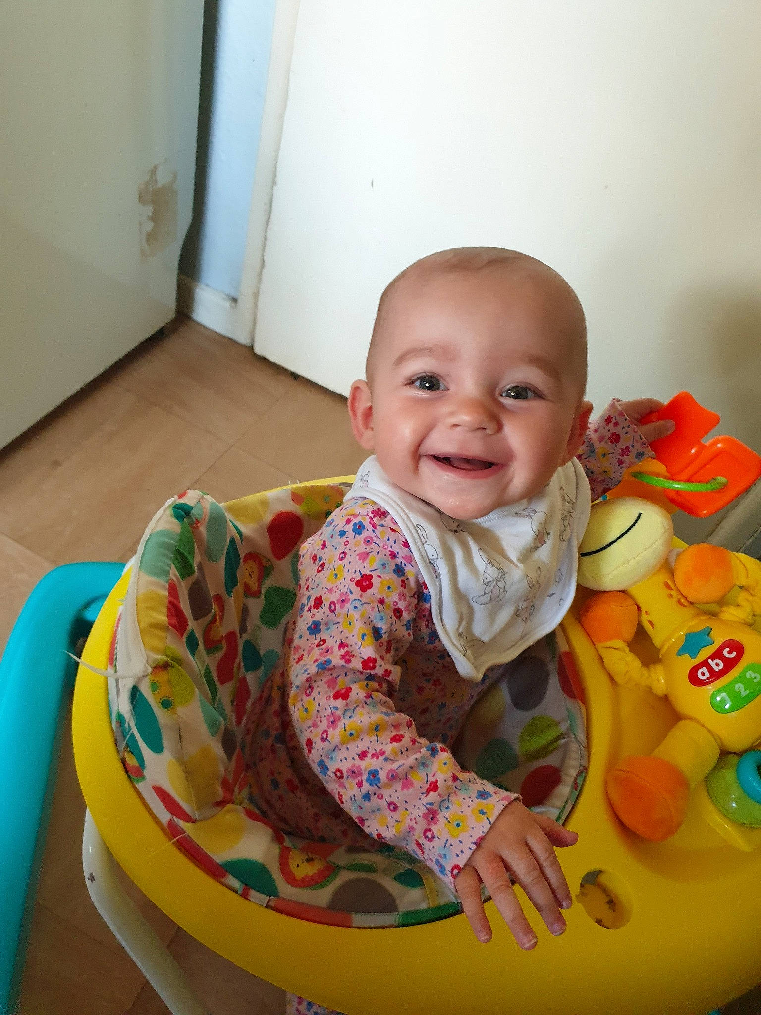 Lilly-mae joined the competition — help win amazing prizes! baby, baby_playing_with_toys, baby_products, baby_toys, cheek, child, person, play, product, sitting, skin, smile, toddler, toy, yellow