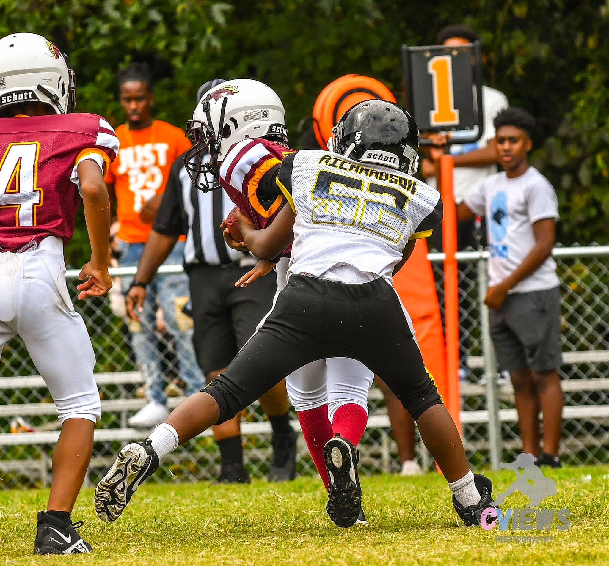 Tré joined the competition — help win amazing prizes! american_football, canadian_football, cleat, face_mask, football_equipment, football_gear, football_helmet, footwear, gridiron_football, helmet, jersey, person, player, shoe, shorts, shoulder_pads, sports_equipment, sports_gear, sports_uniform, sprint_football