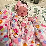 Ruby joined the competition — help win amazing prizes! baby, blanket, bow, child, cute, face, floral_pattern, headband, infant, pillow, pink, resting, sleeping, soft, toddler, wrapped, young_child, heart_pattern, colorful, cozy