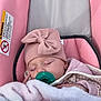 baby, blanket, bundle, car_seat, child, comfort, cozy, cute, hat, headwear, indoor, infant, pacifier, peaceful, pink, portrait, resting, sleeping, soft, wearing