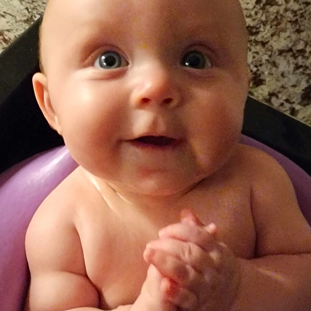 Raelyn is registered to the contest to win money with this photo: arm, baby, babylaughing, bathing, bodypart, face, finger, hand, happy, head, indoors, laughing, mouth, newborn, person, photography, portrait, sitting, smile, teeth