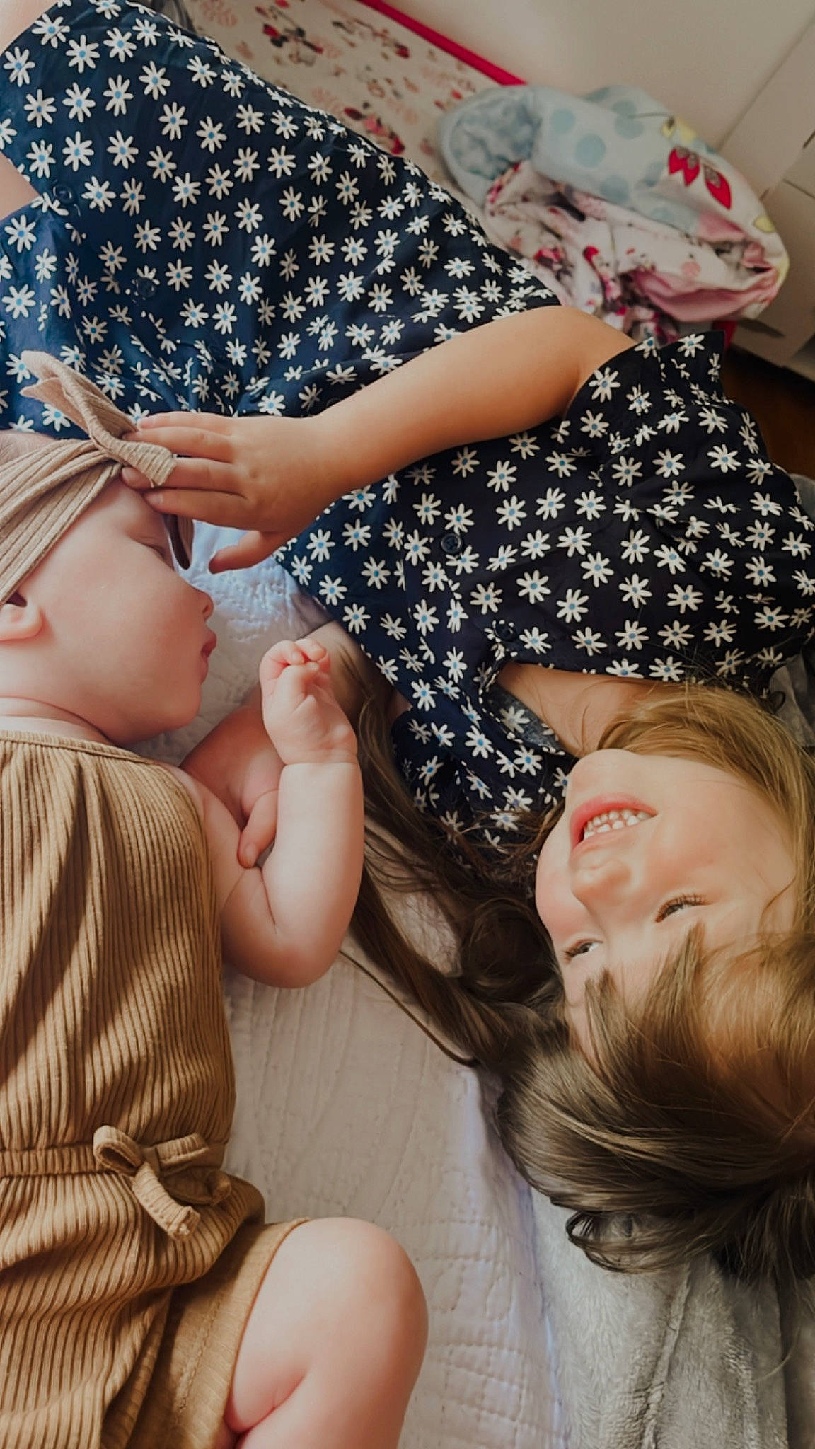 Emersyn is registered to the contest to win money with this photo: child, event, eyelash, eyewear, facial_expression, fashion_accessory, finger, fun, gesture, happy, interaction, joy, mouth, nail, pattern, person, sitting, skin, smile, summer