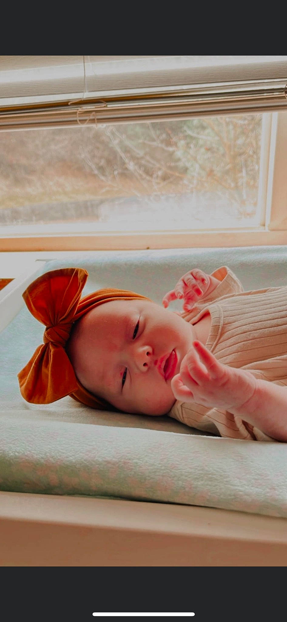 Emersyn is registered to the contest to win money with this photo: baby, baby_sleeping, bedding, blond, comfort, eyelash, fashion_accessory, flooring, fur, hair_accessory, headband, headpiece, human_leg, jewellery, linens, lip, nap, peach, person, window