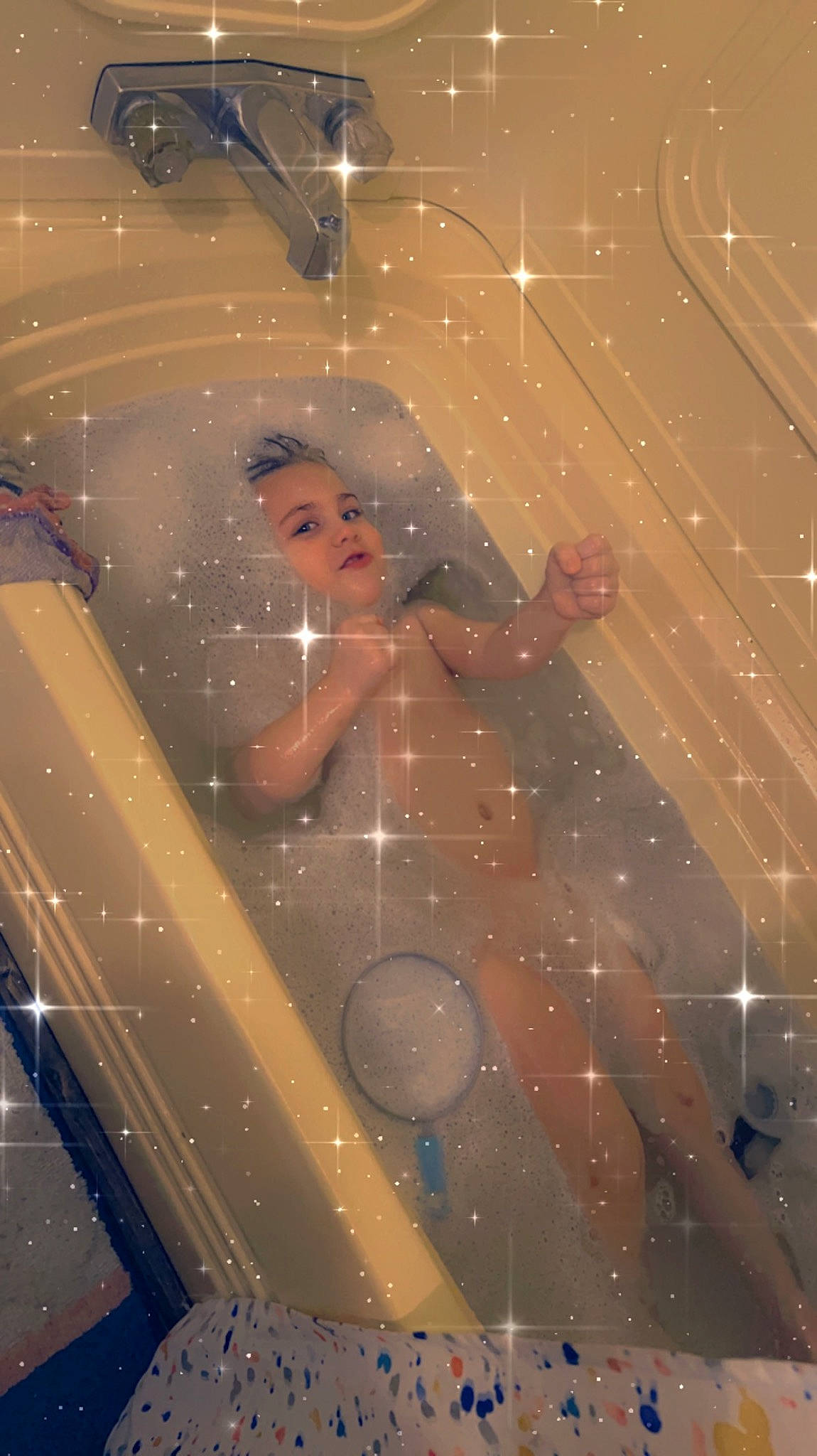 Marleigh joined the competition — help win amazing prizes! automotive_lighting, ceiling, circle, entertainment, event, fun, glass, headlamp, holiday, leisure, lens_flare, metal, night, pattern, performing_arts, person, public_event, reflection, space, standing