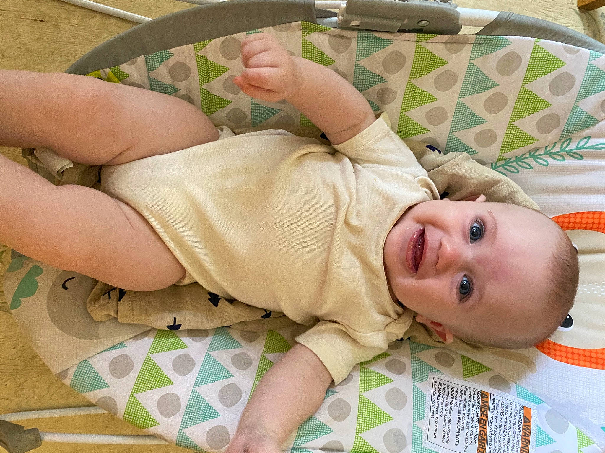 Beckett is registered to the contest to win money with this photo: baby, baby_products, baby_safety, baby_sleeping, baby_toddler_clothing, child, comfort, facial_expression, finger, human_body, human_leg, knee, linens, pattern, person, skin, sleeve, smile, thigh, thumb
