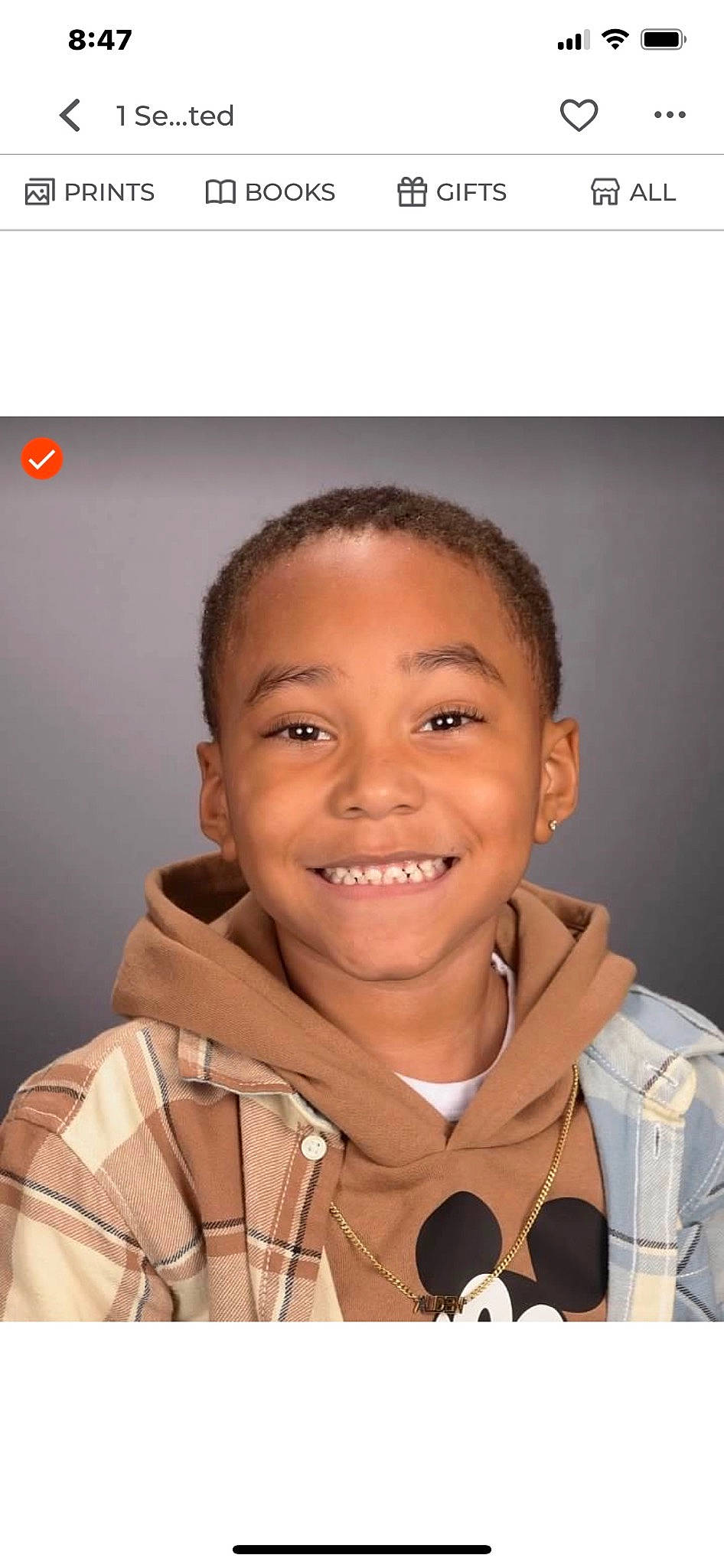 Alden is registered to the contest to win money with this photo: audio_equipment, buzz_cut, cheek, child, event, flash_photography, fun, gesture, happy, joy, laugh, military_person, person, portrait_photography, sitting, sleeve, smile, t_shirt, thumb, tie