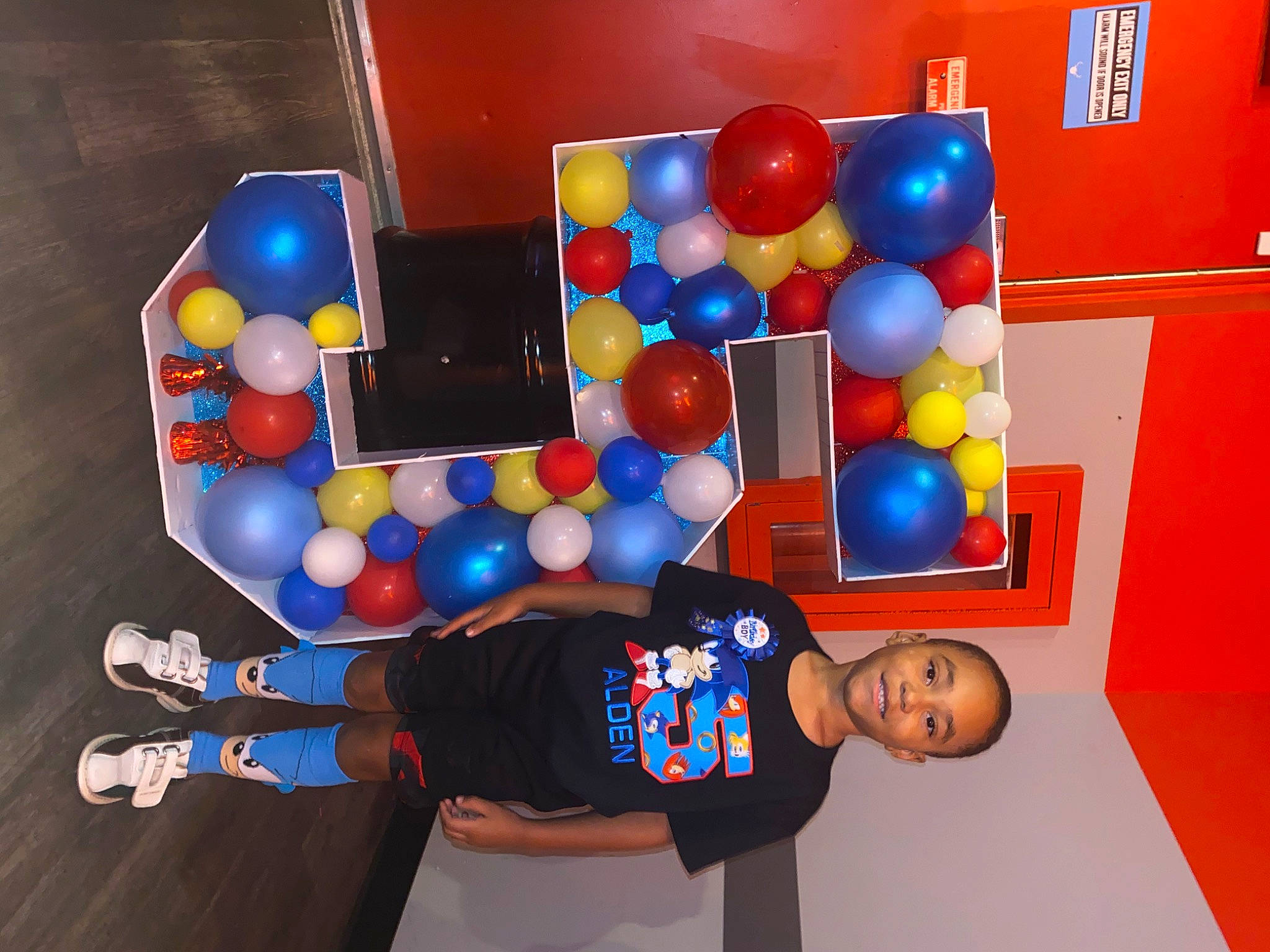 Alden joined the competition — help win amazing prizes! balance, ball, balloon, child, electric_blue, event, fun, joy, leisure, party_supply, person, physical_fitness, play, recreation, room, t_shirt, toy, visual_arts
