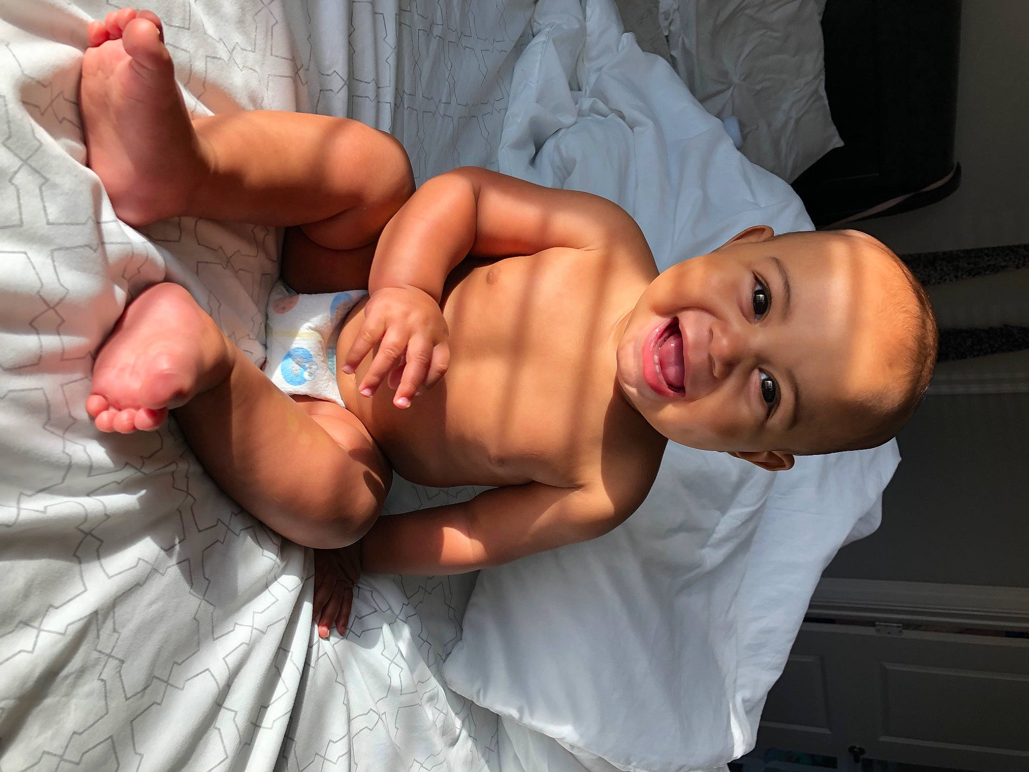 Bentlee is registered to the contest to win money with this photo: baby, chest, comfort, diaper, elbow, facial_expression, finger, flash_photography, hairstyle, human_body, joint, joy, knee, leg, muscle, person, shoulder, skin, smile, stomach