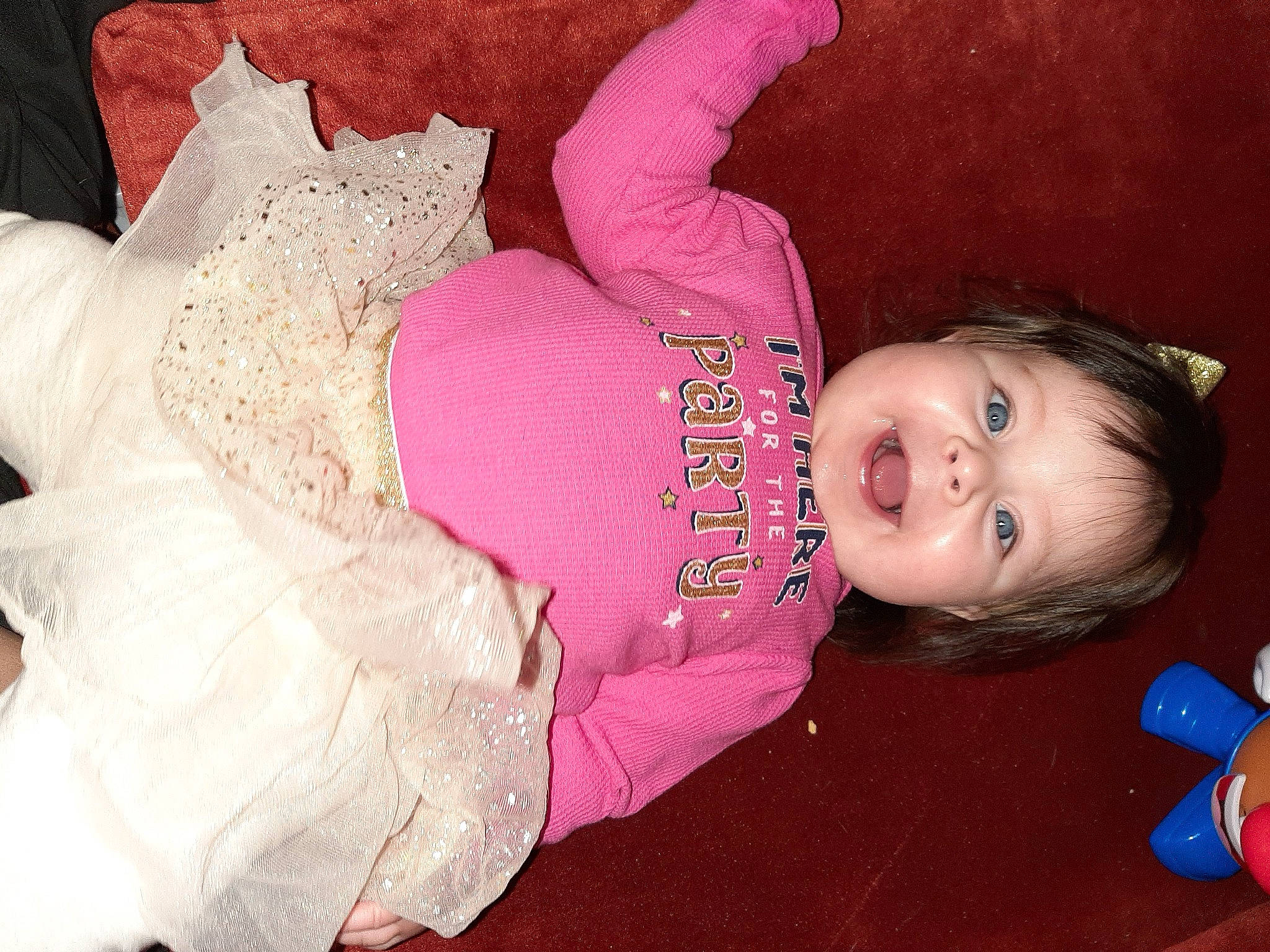 Alena is registered to the contest to win money with this photo: baby, baby_products, baby_toddler_clothing, baby_toys, cheek, child, costume, fun, happy, headgear, magenta, pattern, person, pink, skin, sleeve, smile, toddler