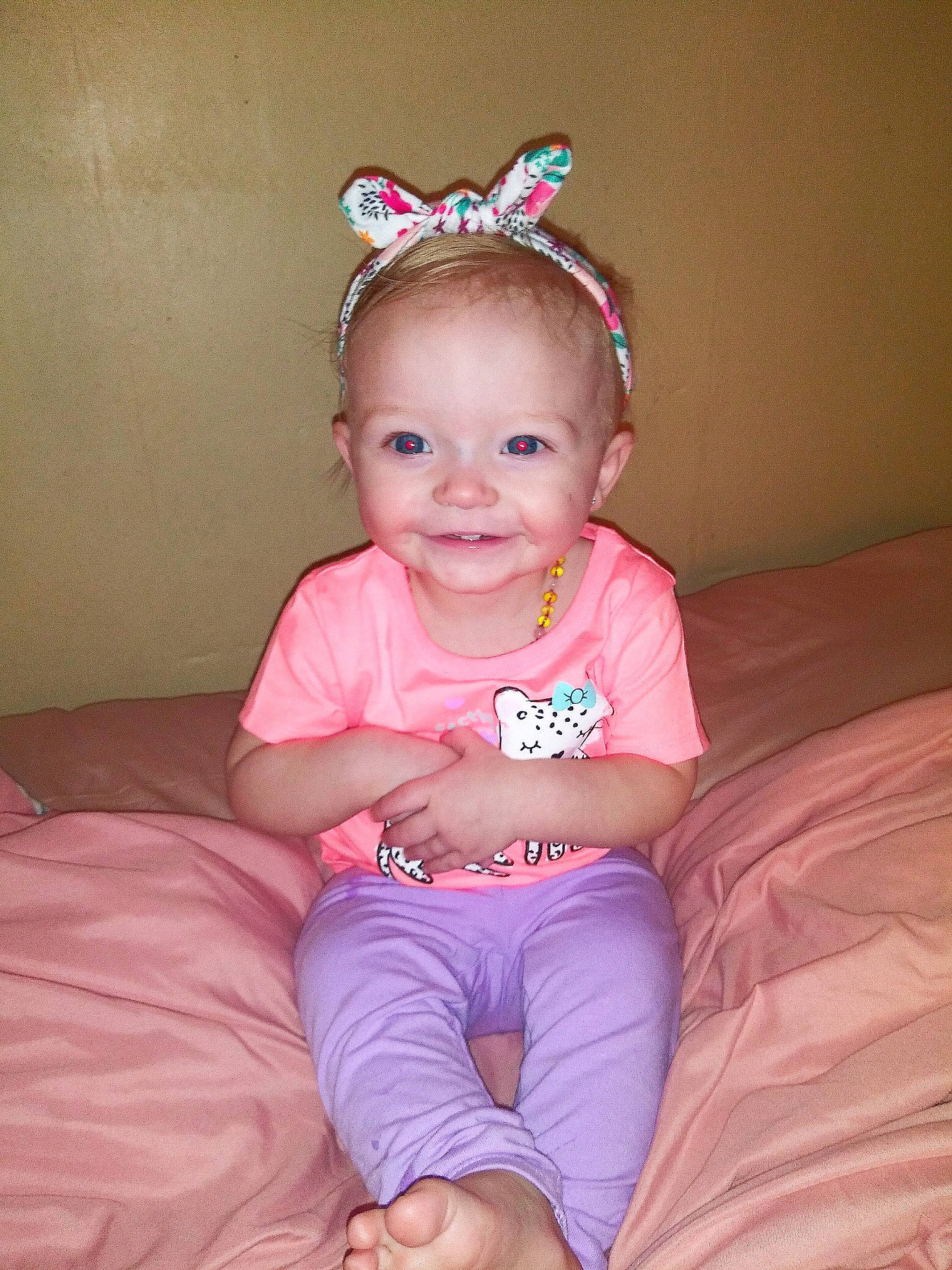 Kingstyn is registered to the contest to win money with this photo: baby, baby_toddler_clothing, cheek, child, comfort, costume_accessory, crown, ear, fashion_accessory, foot, hair_accessory, headband, headgear, headpiece, human_body, joy, lap, person, pink, sitting