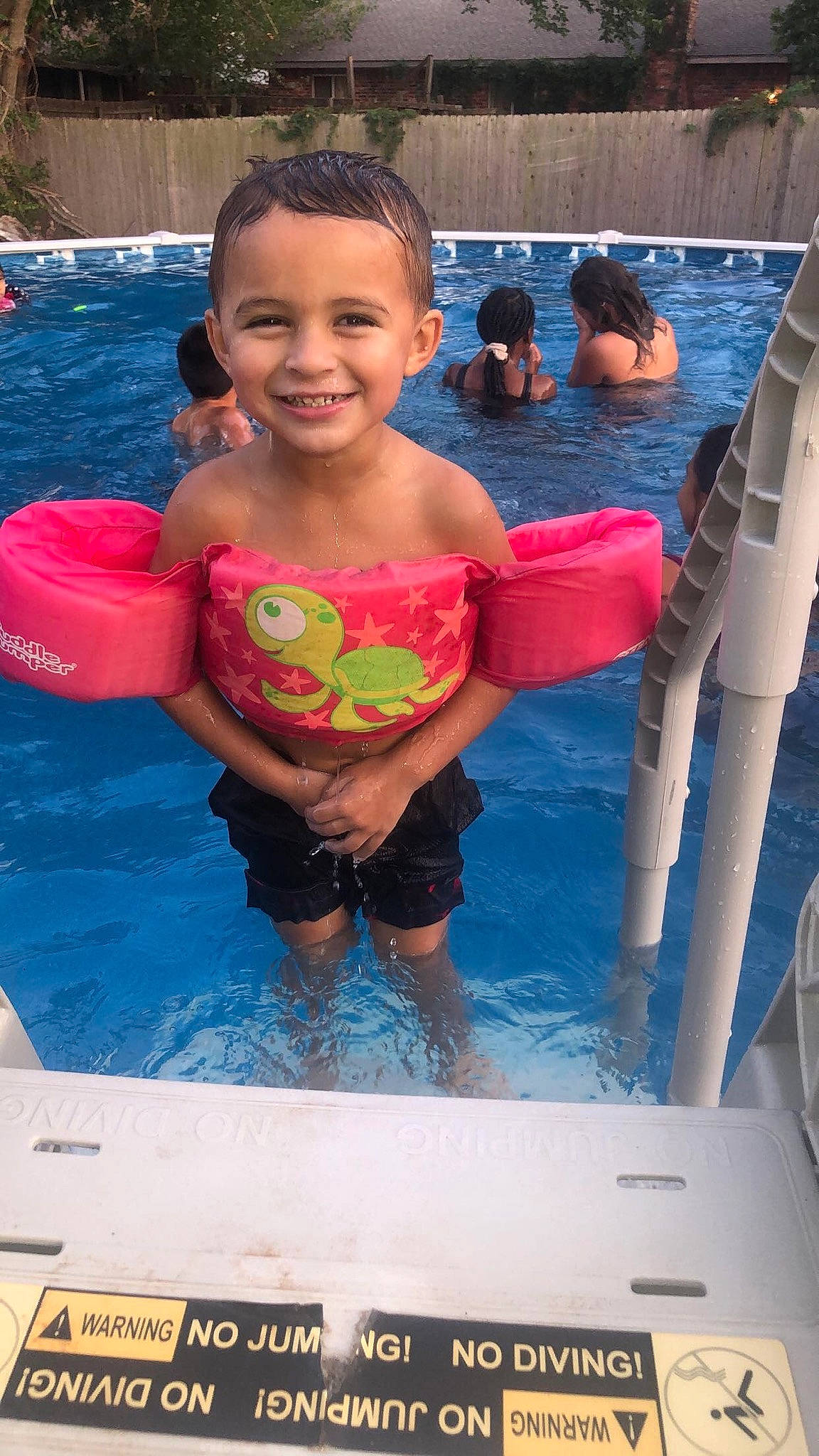Joel joined the competition — help win amazing prizes! face, facial_expression, fun, goggles, hairstyle, happy, joy, leisure, muscle, organ, person, personal_protective_equipment, photograph, pink, recreation, red, smile, summer, swimming_pool, toddler