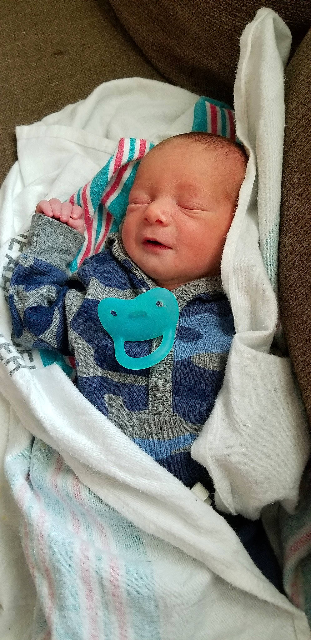 Aidan joined the competition — help win amazing prizes! baby, baby_products, blanket, child, linens, person, product, sleep, toddler, turquoise