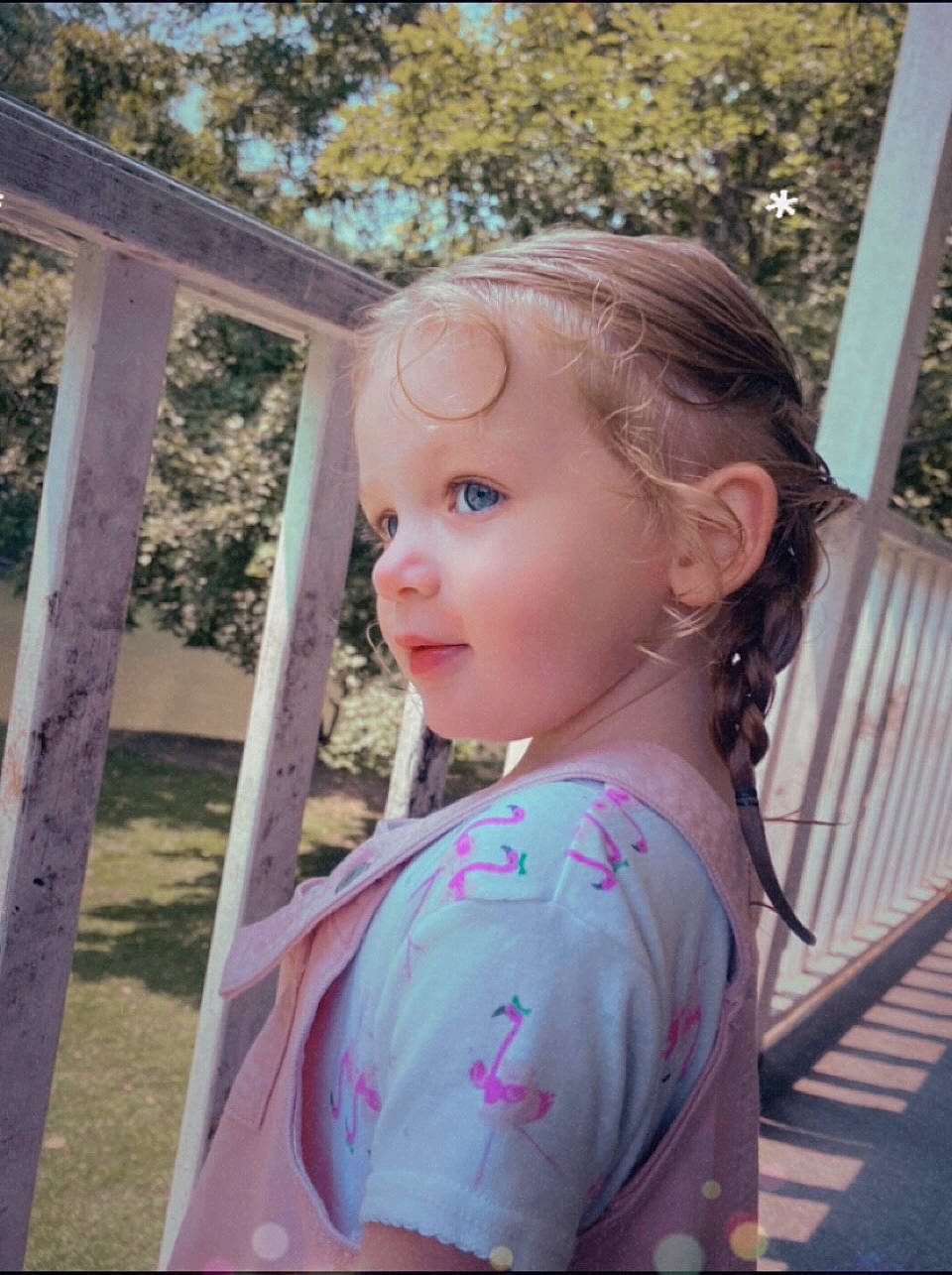 Raelin is registered to the contest to win money with this photo: baby, blond, child, fashion_accessory, fun, garden, grass, happy, leisure, magenta, outdoor_play_equipment, person, pink, plant, recreation, sitting, swing, toddler, tree, vacation