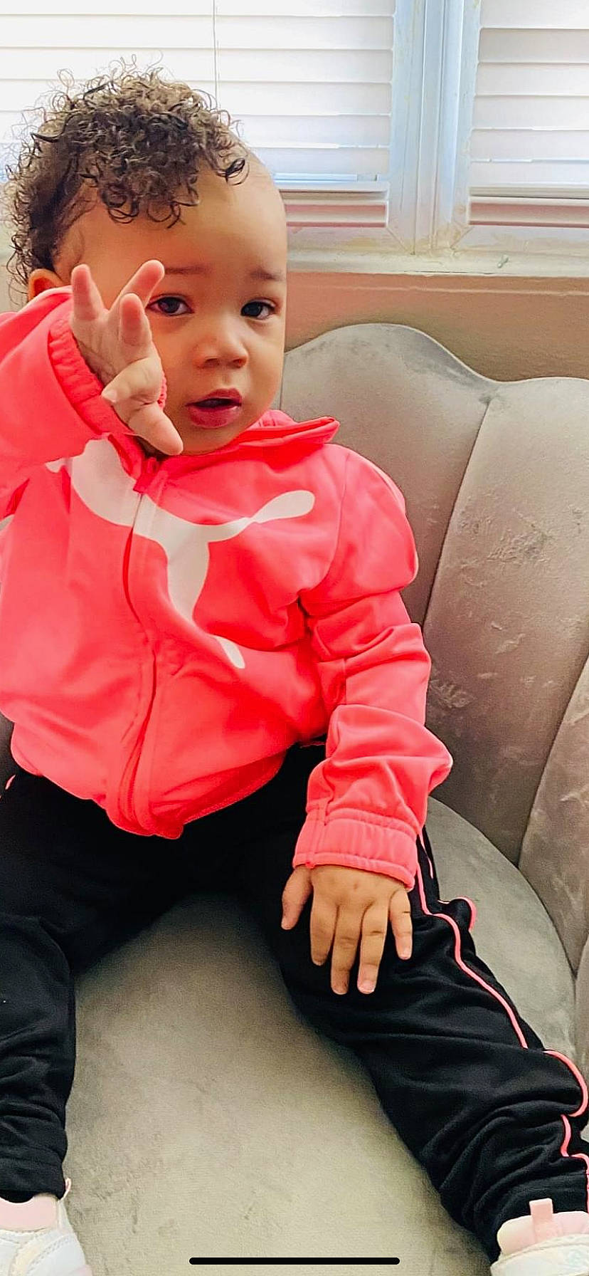 Dream is registered to the contest to win money with this photo: baby, baby_toddler_clothing, beauty, carmine, cheek, child, comfort, eye, eyelash, happy, human_leg, iris, lip, nose, person, personal_protective_equipment, pink, sitting, sleeve, toddler