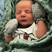 Mordekai is registered to the contest to win money with this photo: baby, blanket, child, clothing, cozy, cute, cute_baby, cute_outfit, infant, lying_down, mittens, newborn, peaceful, portrait, resting, sleeping, soft, toddler, warm, wrapped