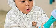 Curtis participe au concours pour gagner de l'argent avec cette photo : bodypart, boy, child, clothing, coat, face, finger, hat, head, hood, hoodie, knitwear, male, people, person, photography, portrait, sleeve, sweater, sweatshirt