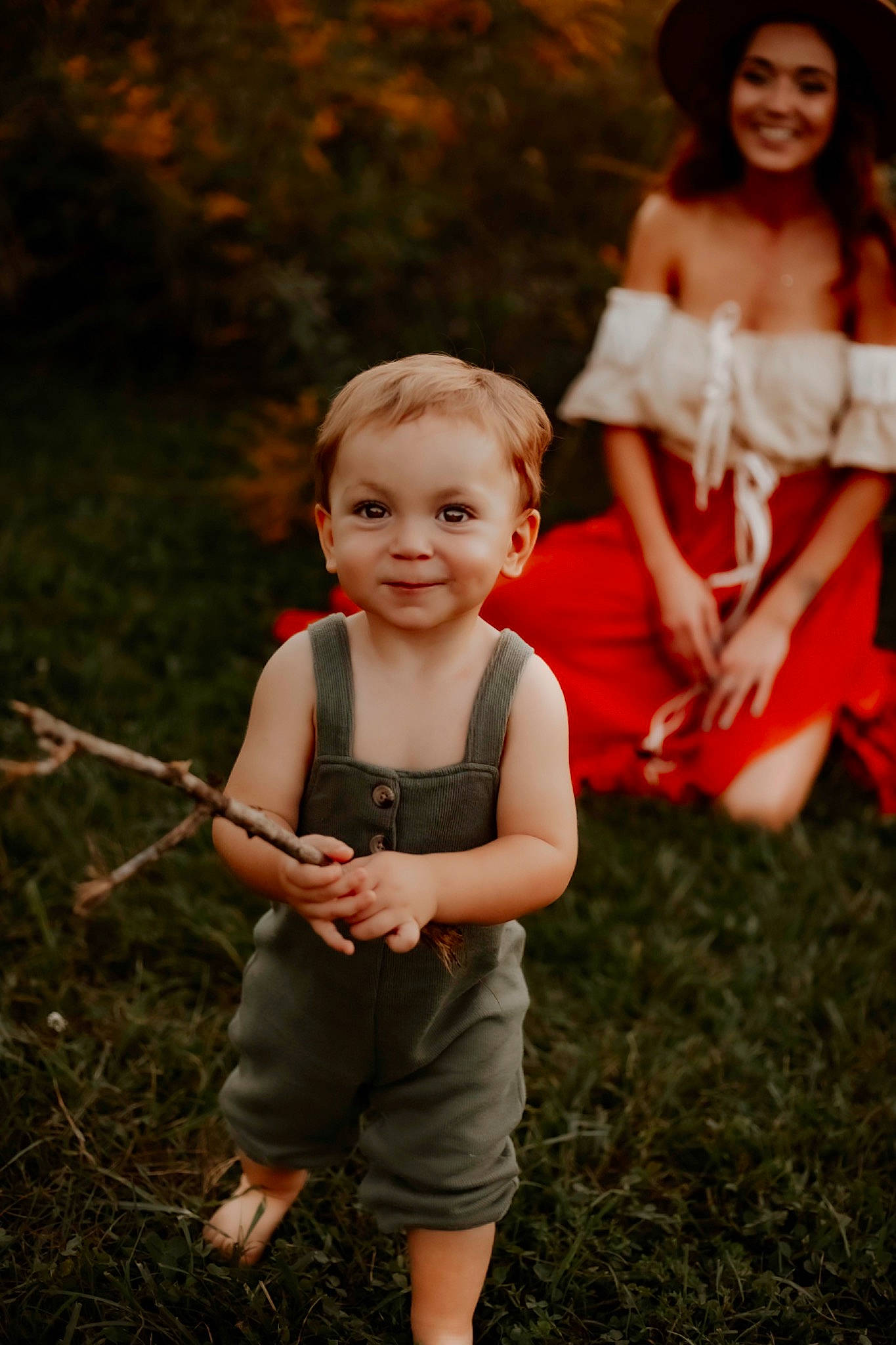 Calvin is registered to the contest to win money with this photo: clothing, dress, eye, face, facial_expression, flash_photography, fun, gesture, grass, hair, hairstyle, happy, head, joy, leaf, people_in_nature, person, plant, skin, smile